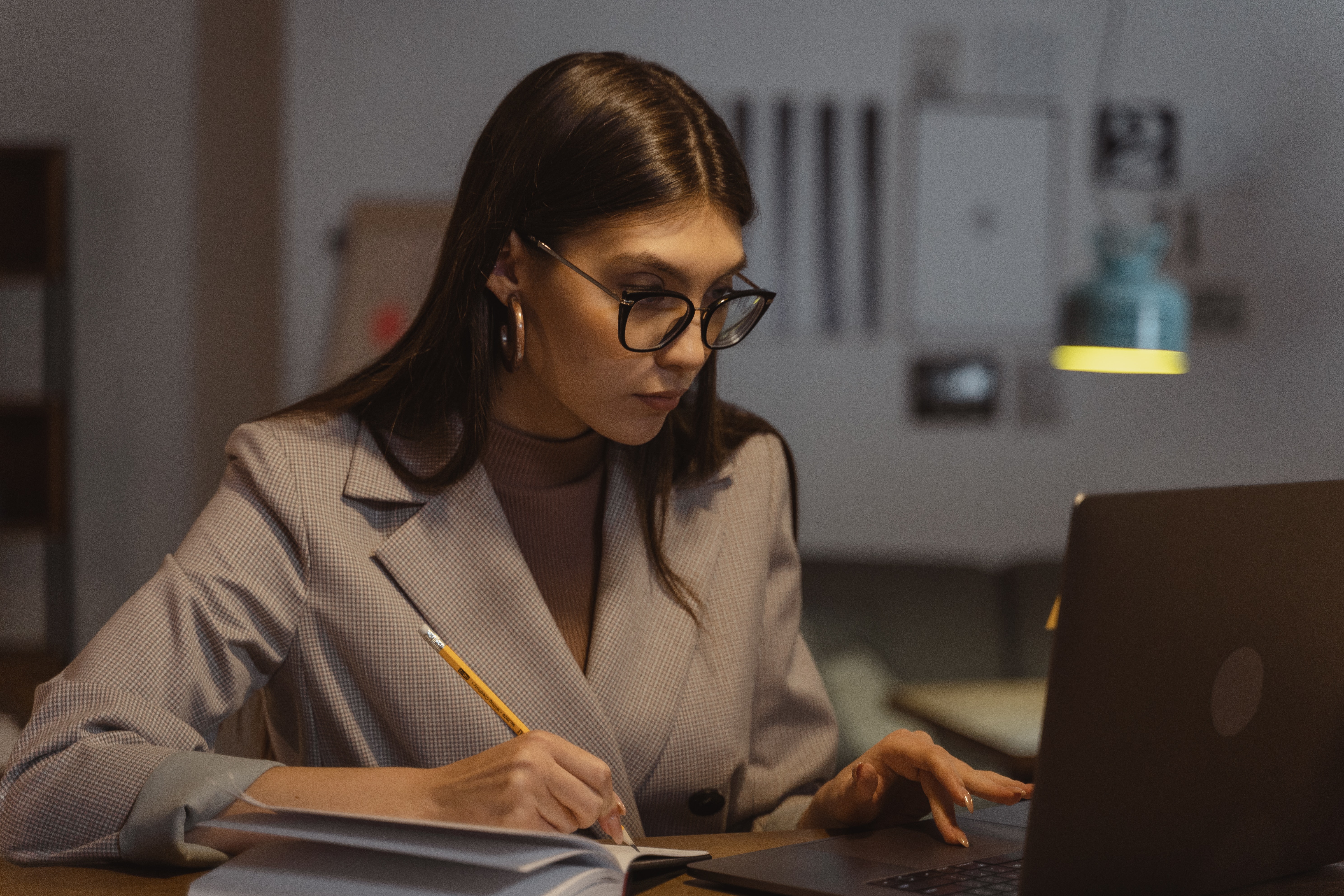 Job Seeker trying to navigate career on laptop and studying
